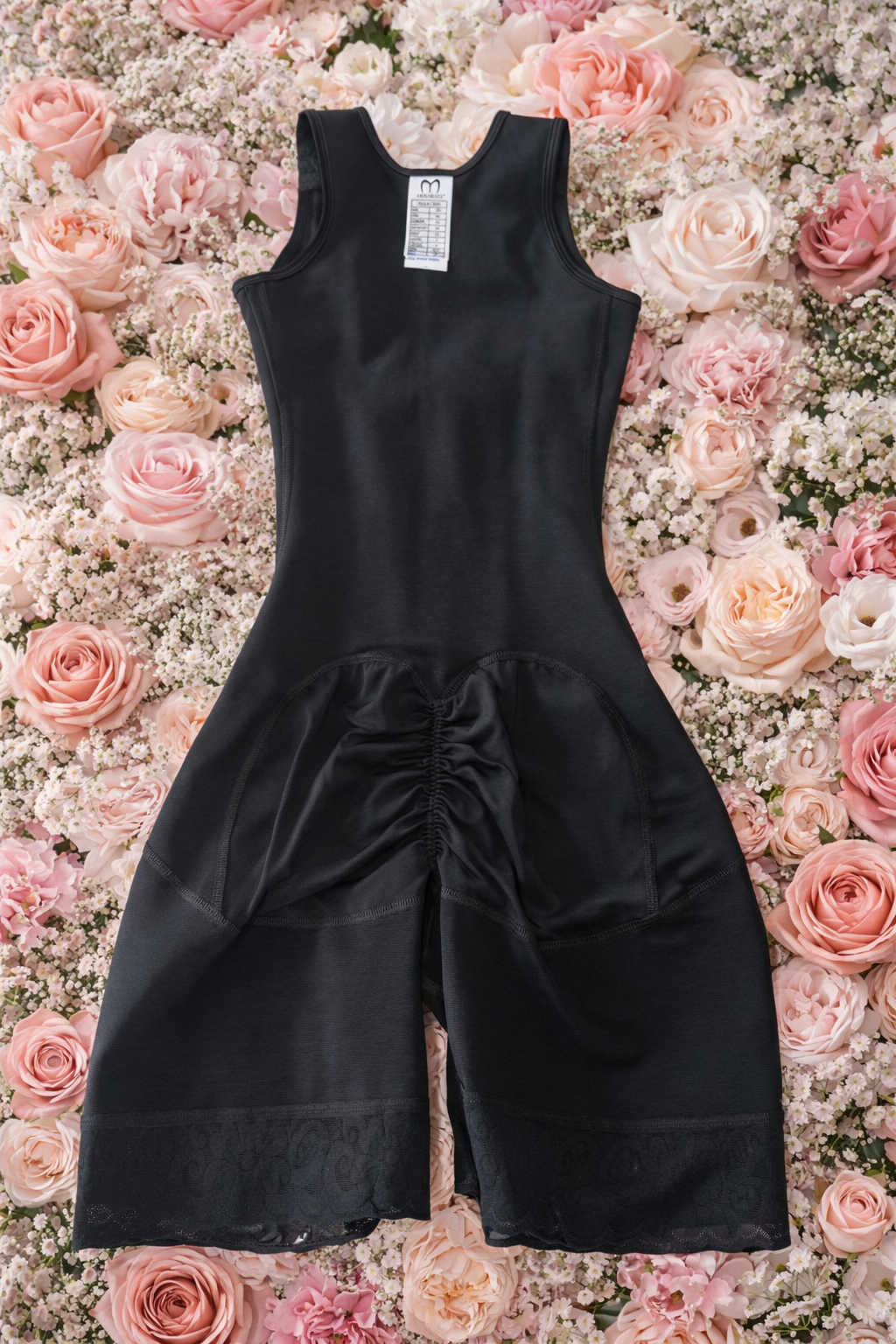 1112 - Short-type body shaper with sleeveless arms, open bust and 4 rows of hooks and eyes